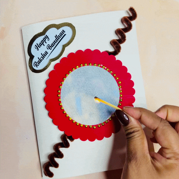 Magic Fire Greeting Photo Card for Rakshabandhan Gift with 1 rakhi, roli chawal and 1 chocolate