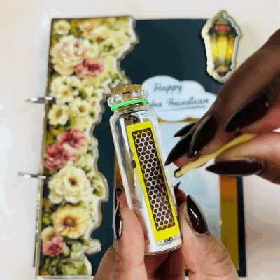 Customized Magical Fire Raksha Bandhan Photo Album with 1 rakhi,roli chawal and 1 chocolate